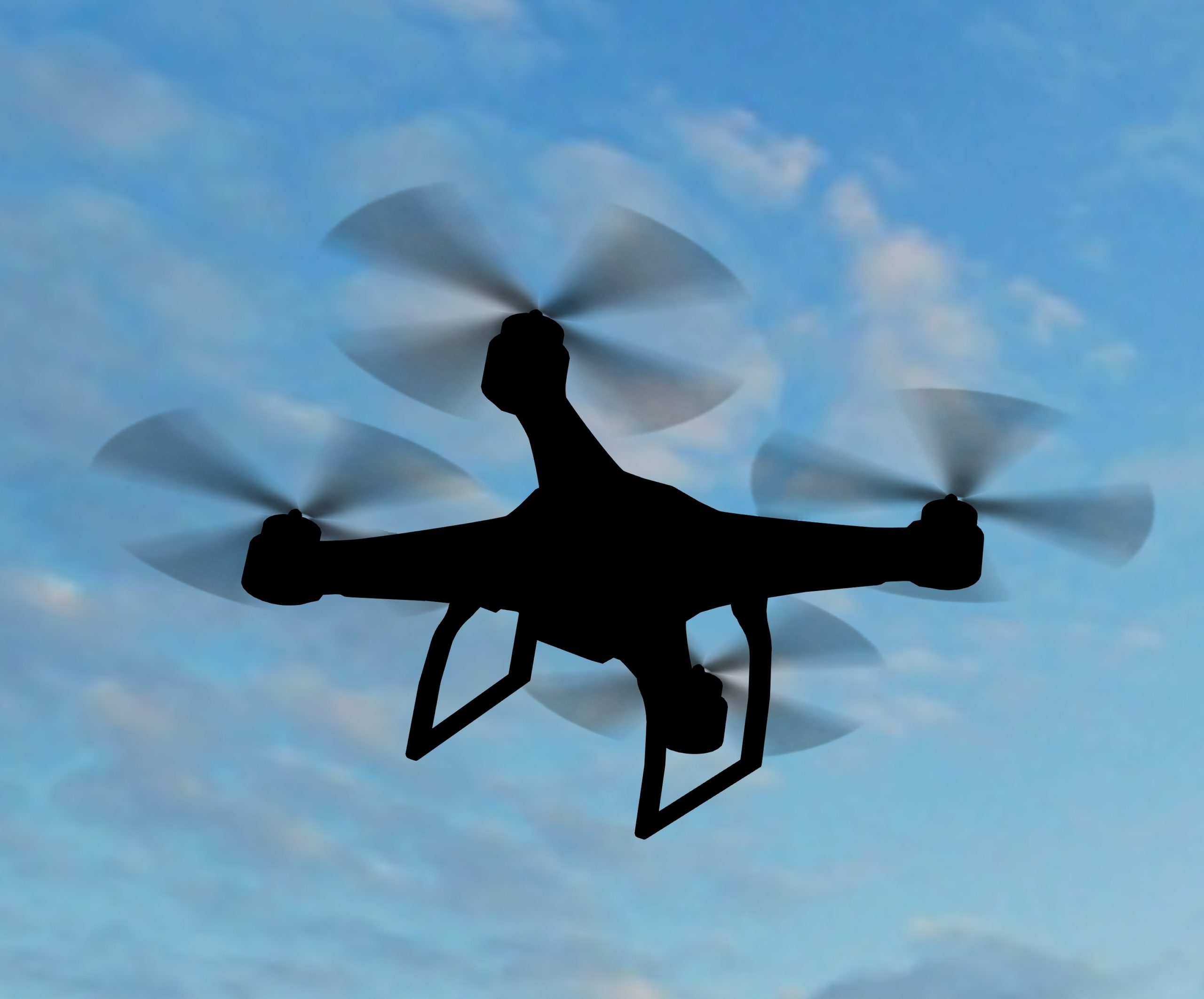 drone quadrocopter hovering in the sky drone quadrocopter hovering in the sky